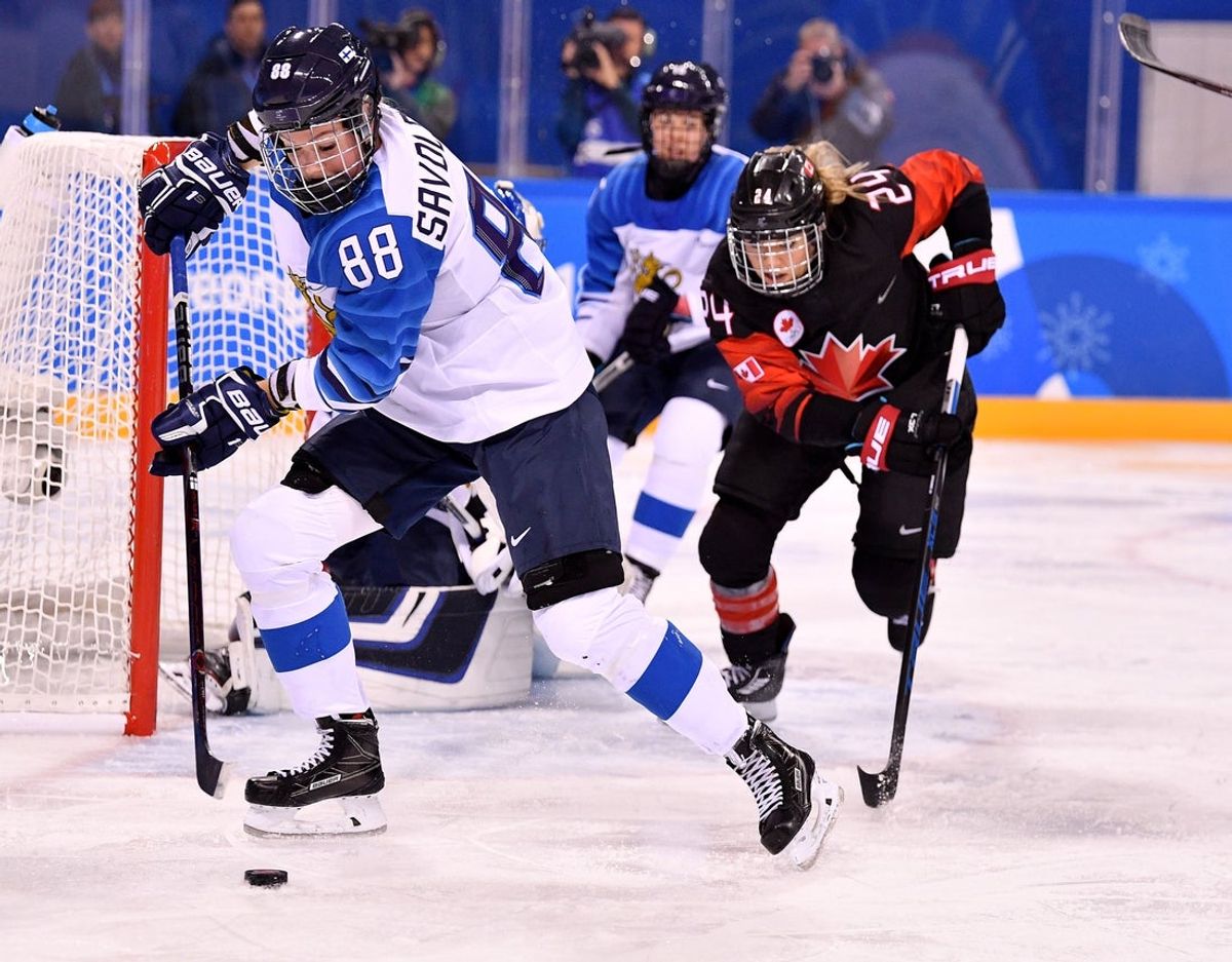 Feb 13, 2018; Gangneung, South Korea; Finland defenseman Ronja Savolainen (88) skates with the puck during a hockey game between Canada and Finland during the Pyeongchang 2018 Olympic Winter Games at Kwandong Hockey Centre.Mandatory Credit: Andrew Nelles-Imagn Images