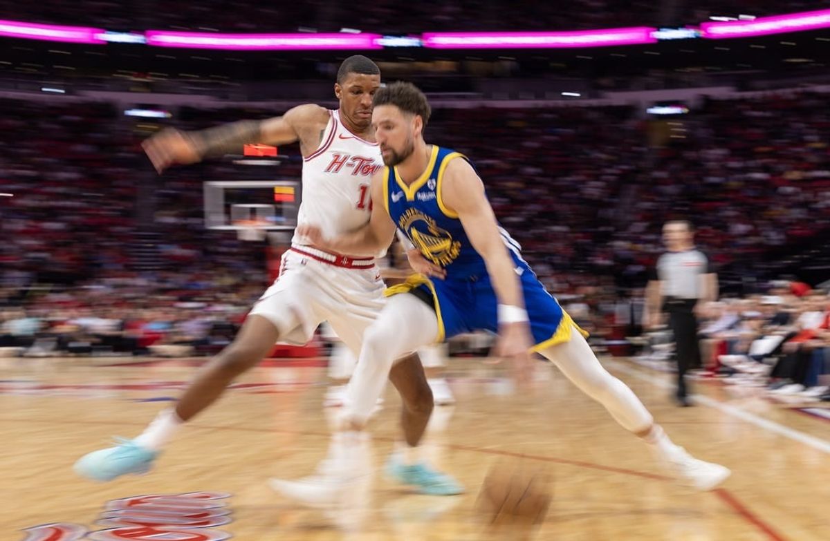 Apr 4, 2024; Houston, Texas, USA; Golden State Warriors guard Klay Thompson (11) dribbles against Houston Rockets forward Jabari Smith Jr. (10) in the second quarter at Toyota Center.