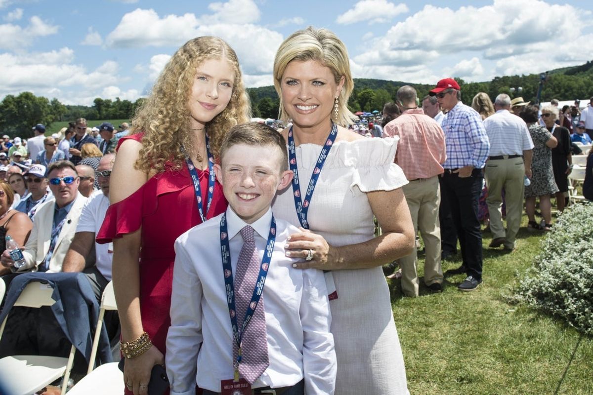 Jul 29, 2018; Cooperstown, NY, USA; Hall of Fame inductee Jim Thome's family, daughter Lila Thome and son Landon Thome and wife Andrea Thome pose for a photo at Clark Sports Center. Mandatory Credit: Gregory J. Fisher-Imagn Images