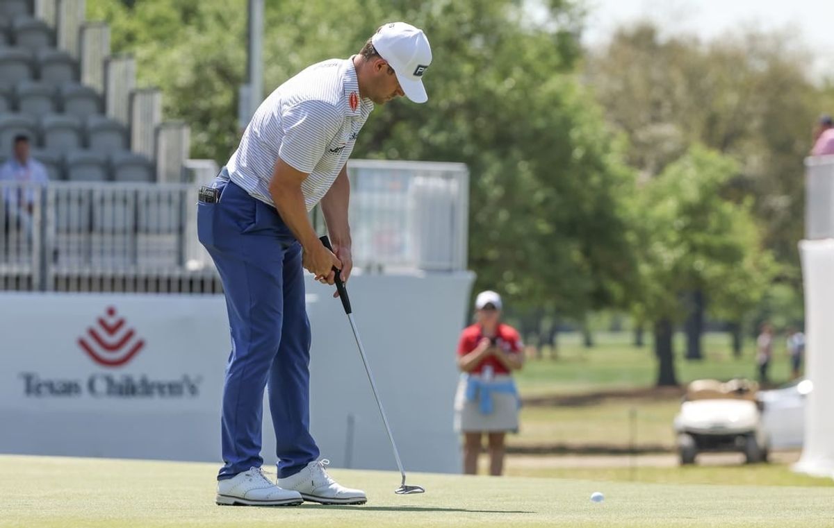 Mar 28, 2024; Houston, Texas, USA; Taylor Moore (USA) sinks his putt on the 18th green during the first round of the Texas Children's Houston Open golf tournament.