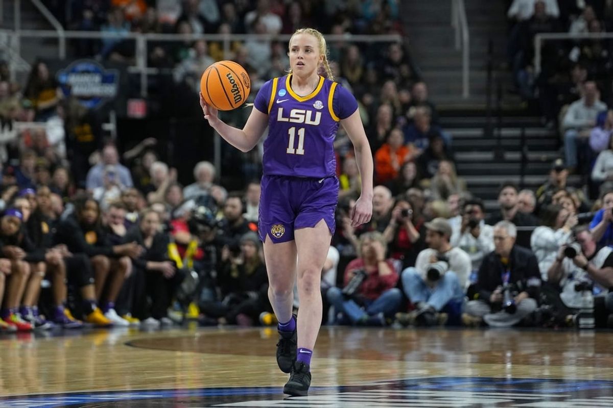Apr 1, 2024; Albany, NY, USA; LSU Lady Tigers guard Hailey Van Lith (11) controls the ball the Iowa Hawkeyes in the first half in the finals of the Albany Regional in the 2024 NCAA Tournament at MVP Arena.