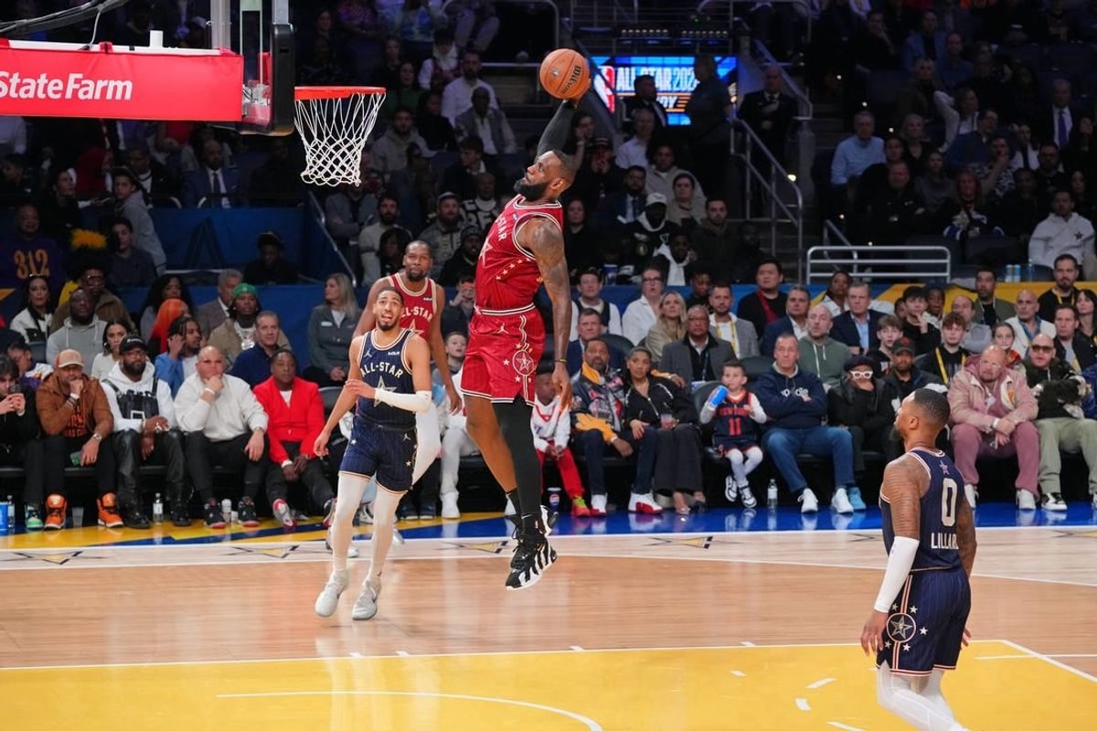Feb 18, 2024; Indianapolis, Indiana, USA; Western Conference forward LeBron James (23) of the Los Angeles Lakers dunks the ball during the first half of the 73rd NBA All Star game at Gainbridge Fieldhouse.