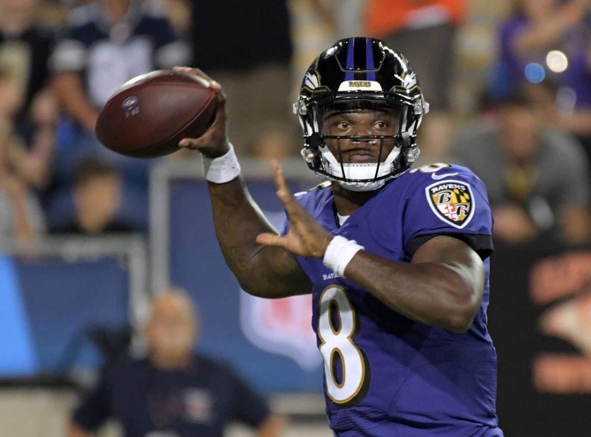 Aug 2, 2018; Canton, OH, USA;  Baltimore Ravens quarterback Lamar Jackson (8) throws a pass against the  Chicago Bears during the Hall of Fame Game at Tom Benson Hall of Fame Stadium. The Ravens defeated the Bears 17-16. Mandatory Credit: Kirby Lee-Imagn Images