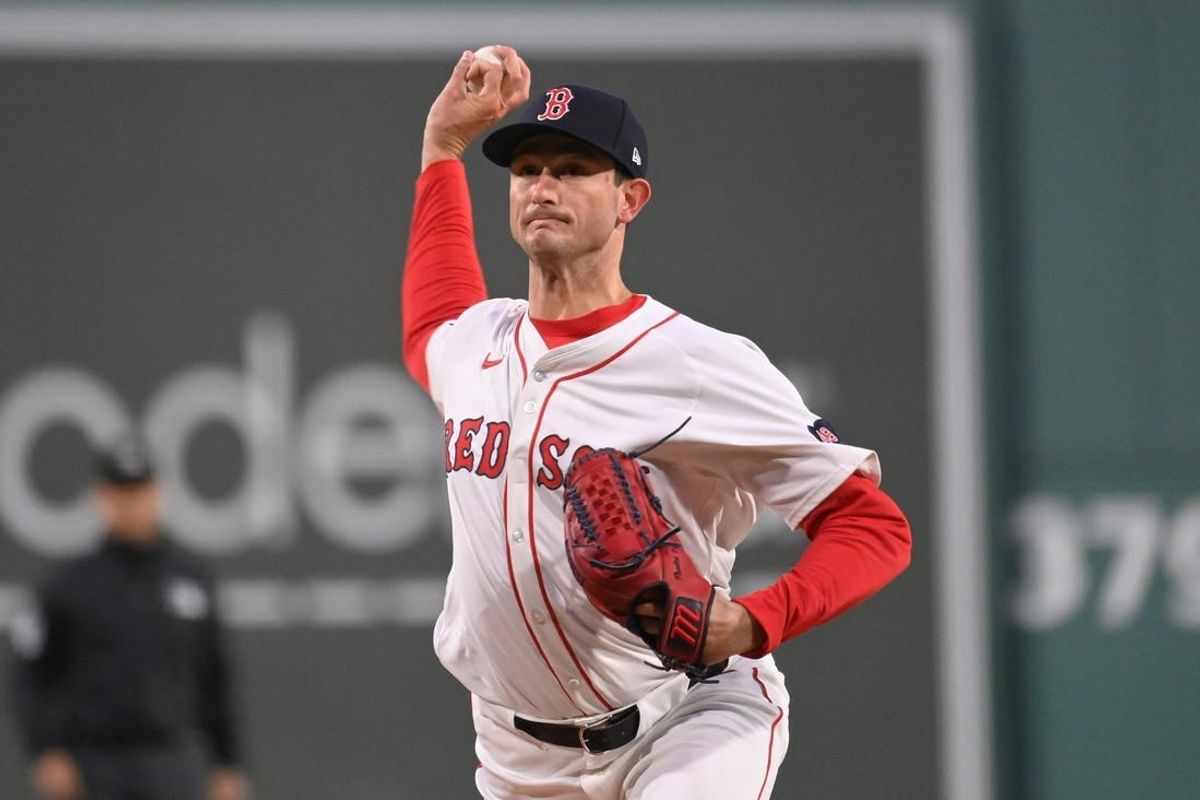 Apr 11, 20024; Boston, Massachusetts, USA; Boston Red Sox starting pitcher Garrett Whitlock (22) pitches against the Baltimore Orioles during the first inning at Fenway Park.
