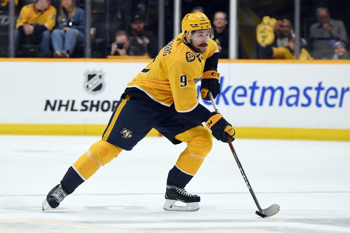 Mar 2, 2024; Nashville, Tennessee, USA; Nashville Predators left wing Filip Forsberg (9) skates with the puck during the first period against the Colorado Avalanche at Bridgestone Arena.