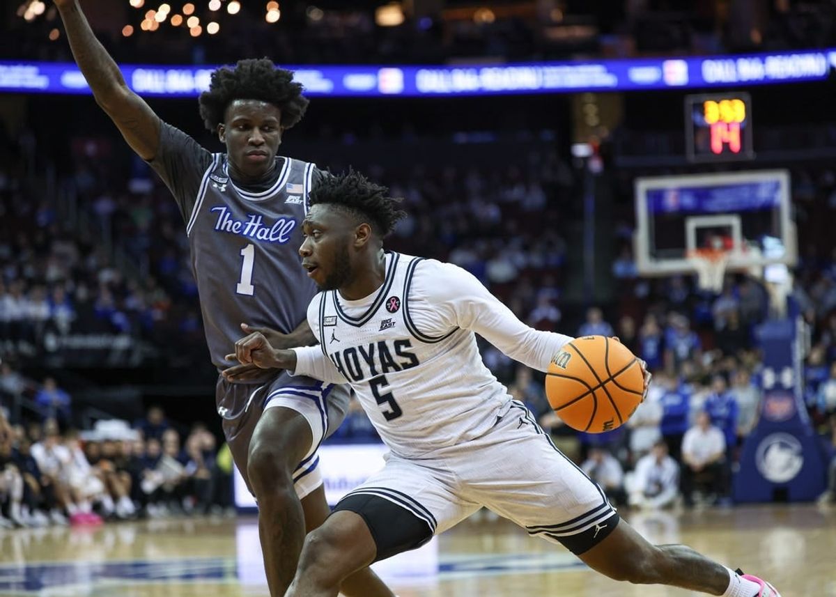 Feb 7, 2024; Newark, New Jersey, USA; Georgetown Hoyas guard Jay Heath (5) dribbles against Seton Hall Pirates guard Kadary Richmond (1) during the first half at Prudential Center.