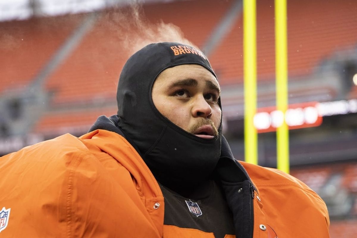 Dec 24, 2022; Cleveland, Ohio, USA; Steam comes off the head of Cleveland Browns offensive tackle Jedrick Wills Jr. (71) as he walks off the field following the game against the New Orleans Saints at FirstEnergy Stadium.