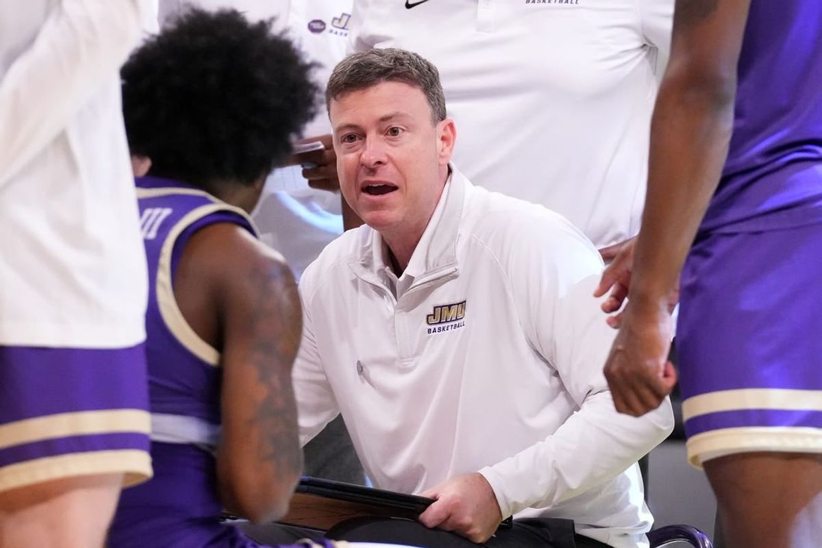 Mar 24, 2024; Brooklyn, NY, USA; James Madison Dukes head coach Mark Byington talks to the team during a time out against the Duke Blue Devils in the second round of the 2024 NCAA Tournament  at Barclays Center.