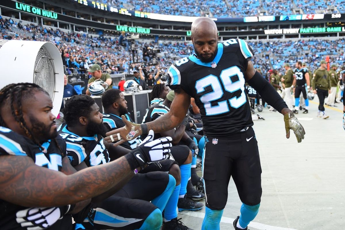 Nov 4, 2018; Charlotte, NC, USA; Carolina Panthers free safety Mike Adams (29) on the sidelines with defensive tackle Dontari Poe (95) in the fourth quarter at Bank of America Stadium. Mandatory Credit: Bob Donnan-Imagn Images
