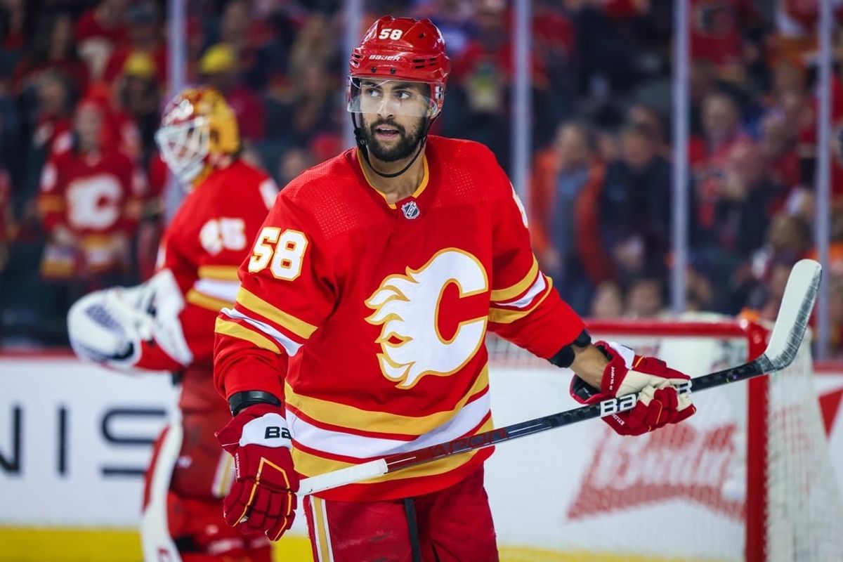 Calgary Flames defenseman Oliver Kylington (58) skates against the Edmonton Oilers during the second period in game two of the second round of the 2022 Stanley Cup Playoffs at Scotiabank Saddledome.