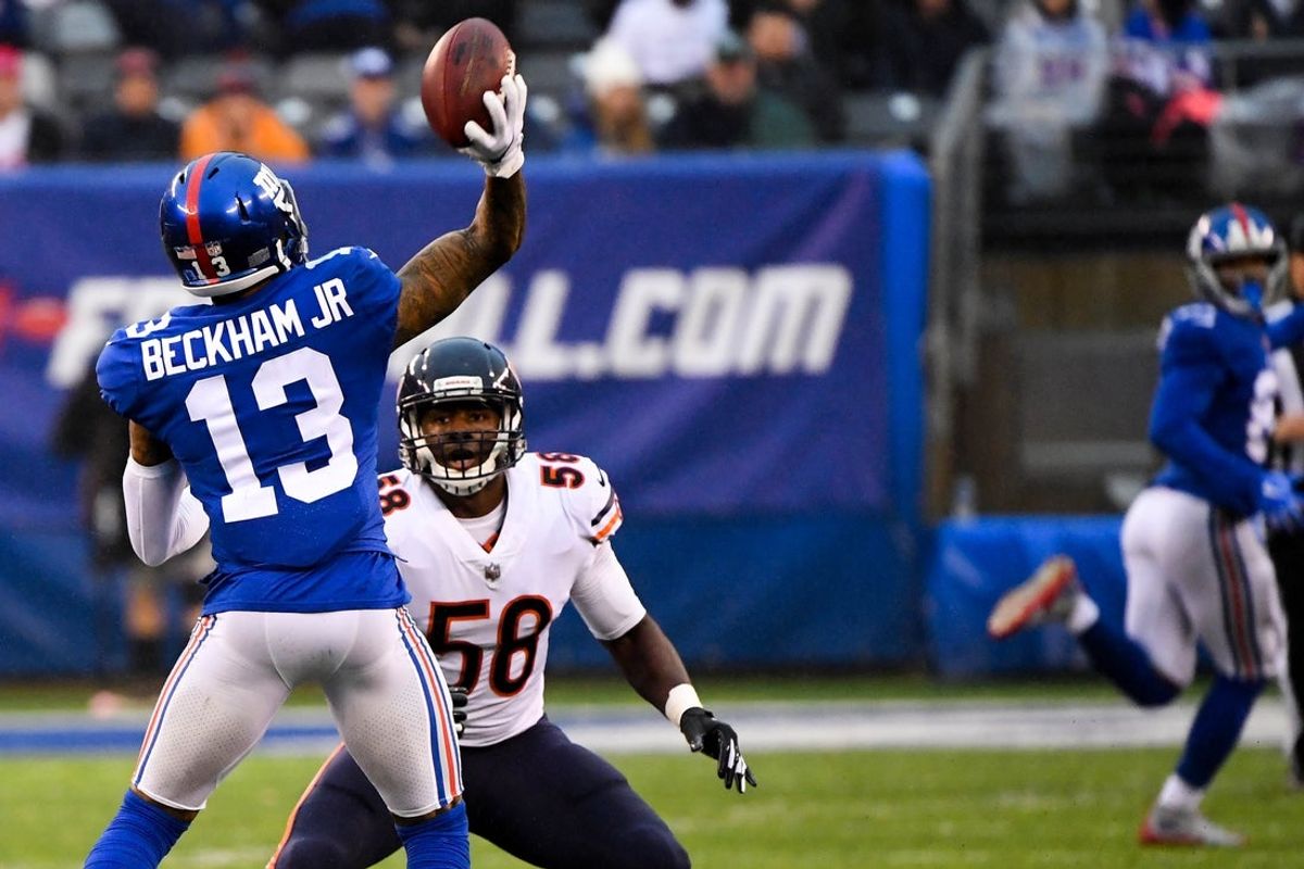 Dec 2, 2018; East Rutherford, NJ, USA;  New York Giants wide receiver Odell Beckham Jr. (13) throws a touchdown pass to New York Giants wide receiver Russell Shepard (81) in the third quarter against the Bears at MetLife Stadium. Mandatory Credit: Robert Deutsch-Imagn Images