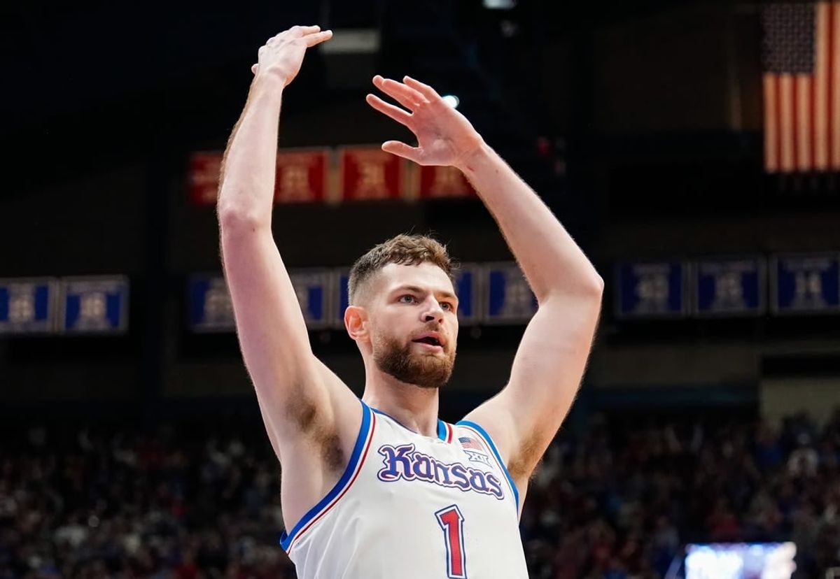 Dec 1, 2023; Lawrence, Kansas, USA; Kansas Jayhawks center Hunter Dickinson (1) celebrates during the first half against the Connecticut Huskies at Allen Fieldhouse.