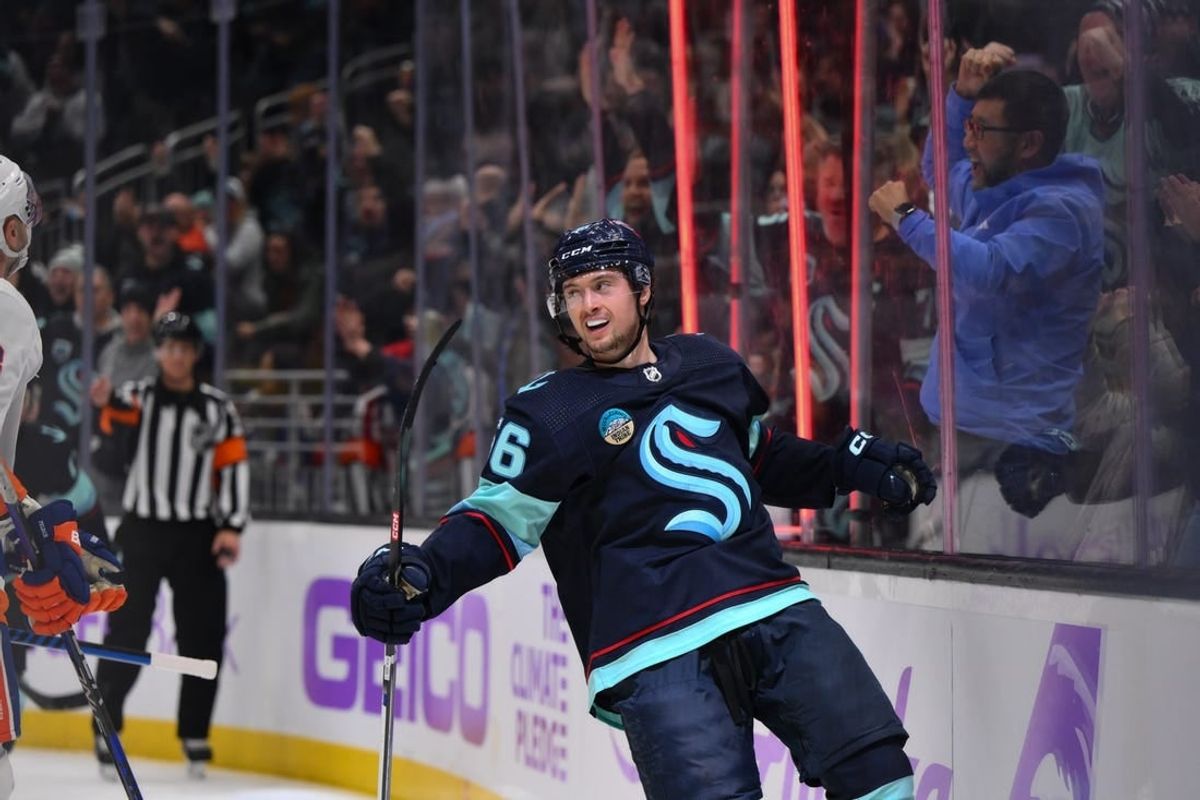 Nov 16, 2023; Seattle, Washington, USA; Seattle Kraken right wing Kailer Yamamoto (56) celebrates after scoring a goal against the New York Islanders during the third period at Climate Pledge Arena.