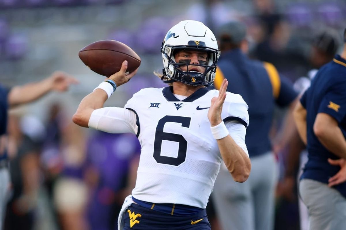 Sep 30, 2023; Fort Worth, Texas, USA; West Virginia Mountaineers quarterback Garrett Greene (6) throws a pass before the game against the TCU Horned Frogs at Amon G. Carter Stadium.