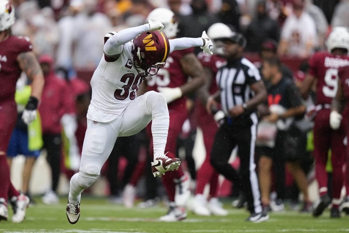 Sep 10, 2023; Landover, Maryland, USA; Washington Commanders safety Jeremy Reaves (39) reacts after a play in the second half against the Arizona Cardinals at FedExField.
