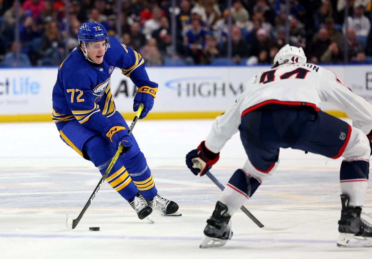 Dec 30, 2023; Buffalo, New York, USA;  Columbus Blue Jackets defenseman Erik Gudbranson (44) looks to block a pass by Buffalo Sabres right wing Tage Thompson (72) during the second period at KeyBank Center.