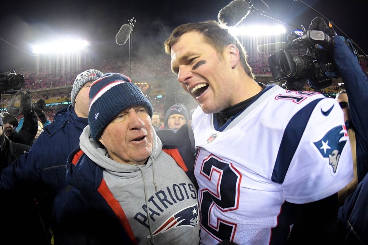Jan 20, 2019; Kansas City, MO, USA; New England Patriots head coach Bill Belichick and quarterback Tom Brady (12) celebrate the win over the Kansas City Chiefs during overtime in the AFC Championship game at Arrowhead Stadium. Mandatory Credit: Kirby Lee-Imagn Images