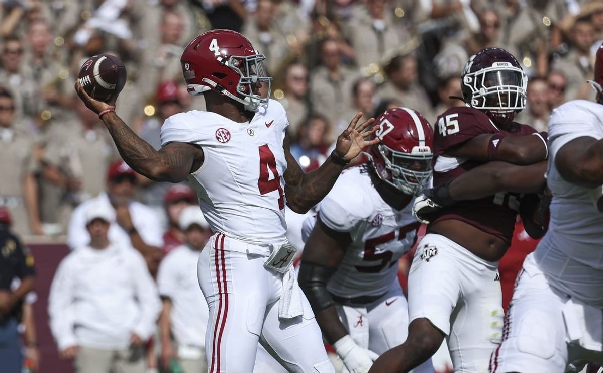 Oct 7, 2023; College Station, Texas, USA; Alabama Crimson Tide quarterback Jalen Milroe (4) attempts a pass during the second quarter against the Texas A&M Aggies at Kyle Field.