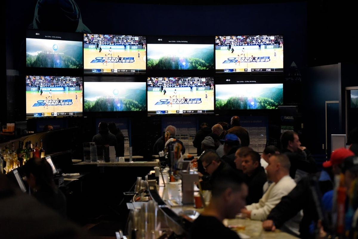 Sports fans bet and watch the first games of the NCAA basketball tournament in the FanDuel Sportsbook at the Meadowlands Racetrack on Thursday, March 21, 2019, in East Rutherford.

Meadowlands March Madness Gambling