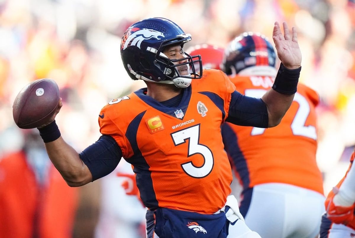 Nov 26, 2023; Denver, Colorado, USA; Denver Broncos quarterback Russell Wilson (3) throws the ball in the second quarter against the Cleveland Browns at Empower Field at Mile High.