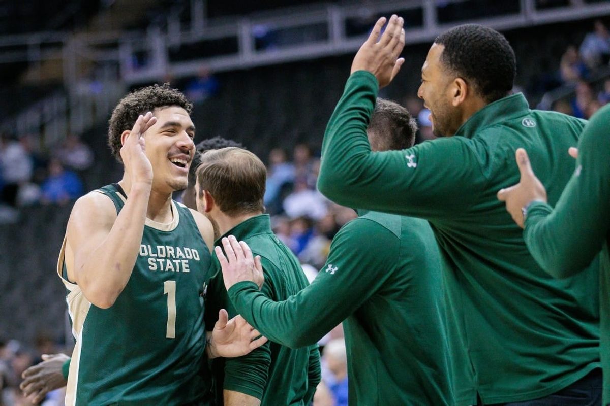 Nov 23, 2023; Kansas City, Missouri, USA; Colorado State Rams forward Joel Scott (1) celebrates with the bench during the game against the Creighton Bluejays at T-Mobile Center.