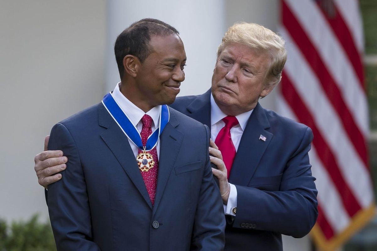 May 6, 2019; Washington, D.C., USA;  President Donald Trump presents the Presidential Medal of Freedom to Tiger Woods during an event at the White House in the Rose Garden. Mandatory Credit: Scott Taetsch-Imagn Images