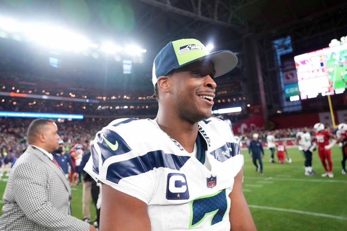 Jan 7, 2024; Glendale, Arizona, USA; Seattle Seahawks quarterback Geno Smith (7) reacts after the game against the Arizona Cardinals at State Farm Stadium.