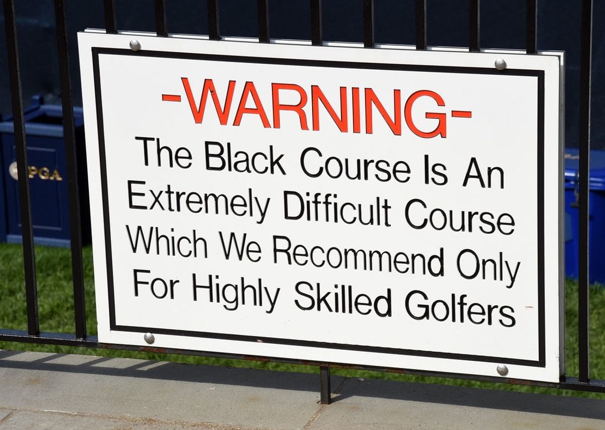 May 15, 2019; Farmingdale, NY, USA; The warning sign outside the clubhouse seen during a practice round for the PGA Championship golf tournament at Bethpage State Park - Black Course. Mandatory Credit: John David Mercer-Imagn Images