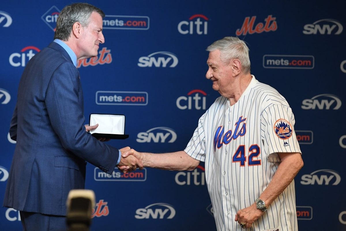 New York City Mayor Bill de Blasio presents Ron Taylor of the 1969 Mets championship team with a key to the city as part of the Mets' 1969 50th Anniversary Celebration before the start of a game against the Braves at Citi Field on Saturday, June 29, 2019. 

Mets 1969 50th Anniversary Ceremony