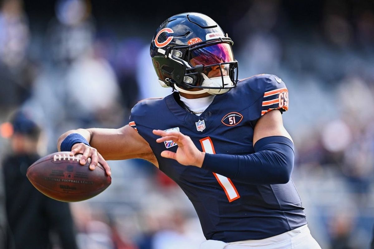 Oct 15, 2023; Chicago, Illinois, USA;  Chicago Bears quarterback Justin Fields (1) warms up before a game against the Minnesota Vikings at Soldier Field.