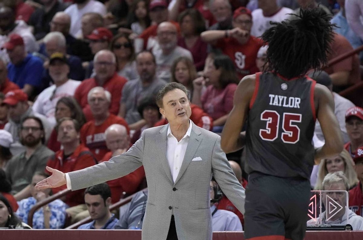 Nov 17, 2023; Charleston, SC, USA; St. John's Red Storm head coach Rick Pitino talks with St. John's Red Storm forward Glenn Taylor Jr. (35) in the first half at TD Arena.