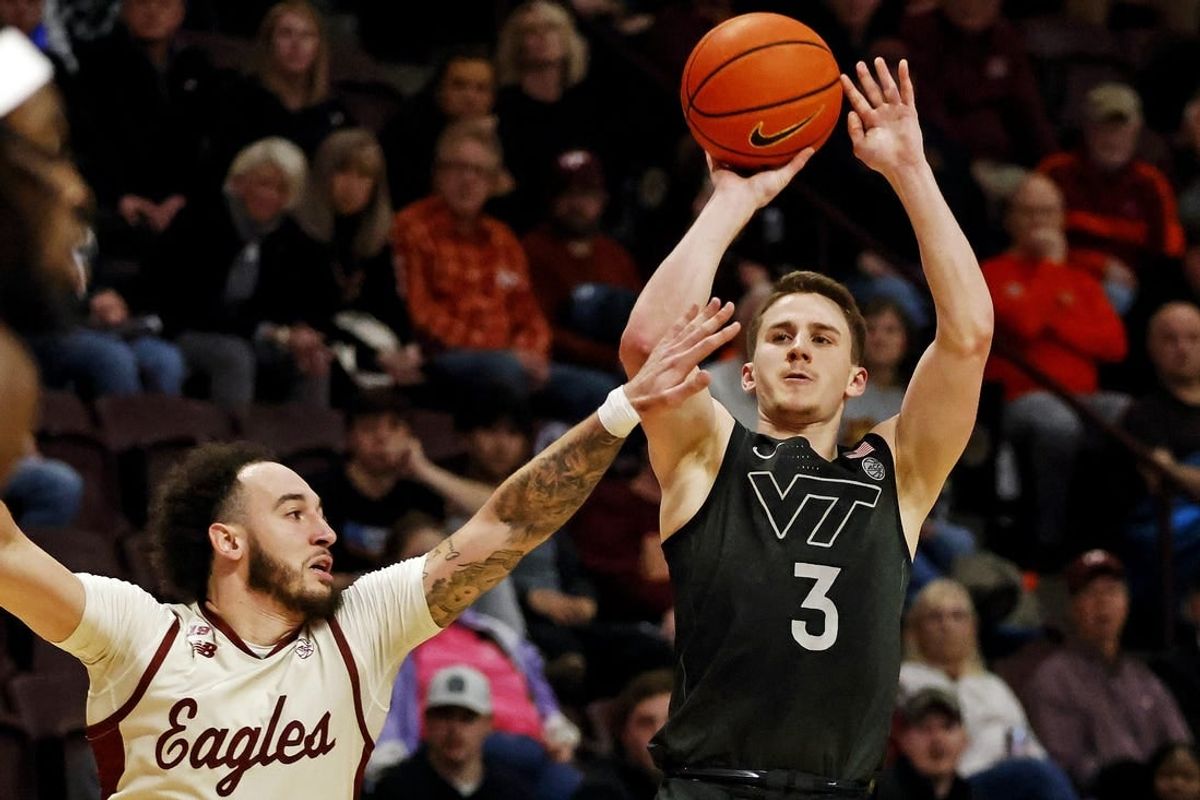 Jan 23, 2024; Blacksburg, Virginia, USA; Virginia Tech Hokies guard Sean Pedulla (3) shoots the ball against Boston College Eagles guard Jaeden Zackery (3) during the second half at Cassell Coliseum.