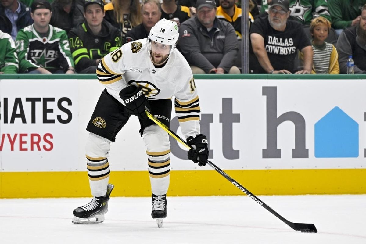 Nov 6, 2023; Dallas, Texas, USA; Boston Bruins center Pavel Zacha (18) in action during the game between the Dallas Stars and the Boston Bruins at the American Airlines Center.