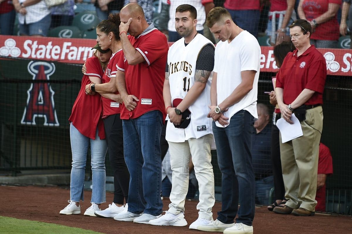 Jul 12, 2019; Anaheim, CA, USA; The family of Tyler Skaggs stands on the field for a moment of silence prior to the game against the Seattle Mariners at Angel Stadium of Anaheim. Mandatory Credit: Kelvin Kuo-Imagn Images