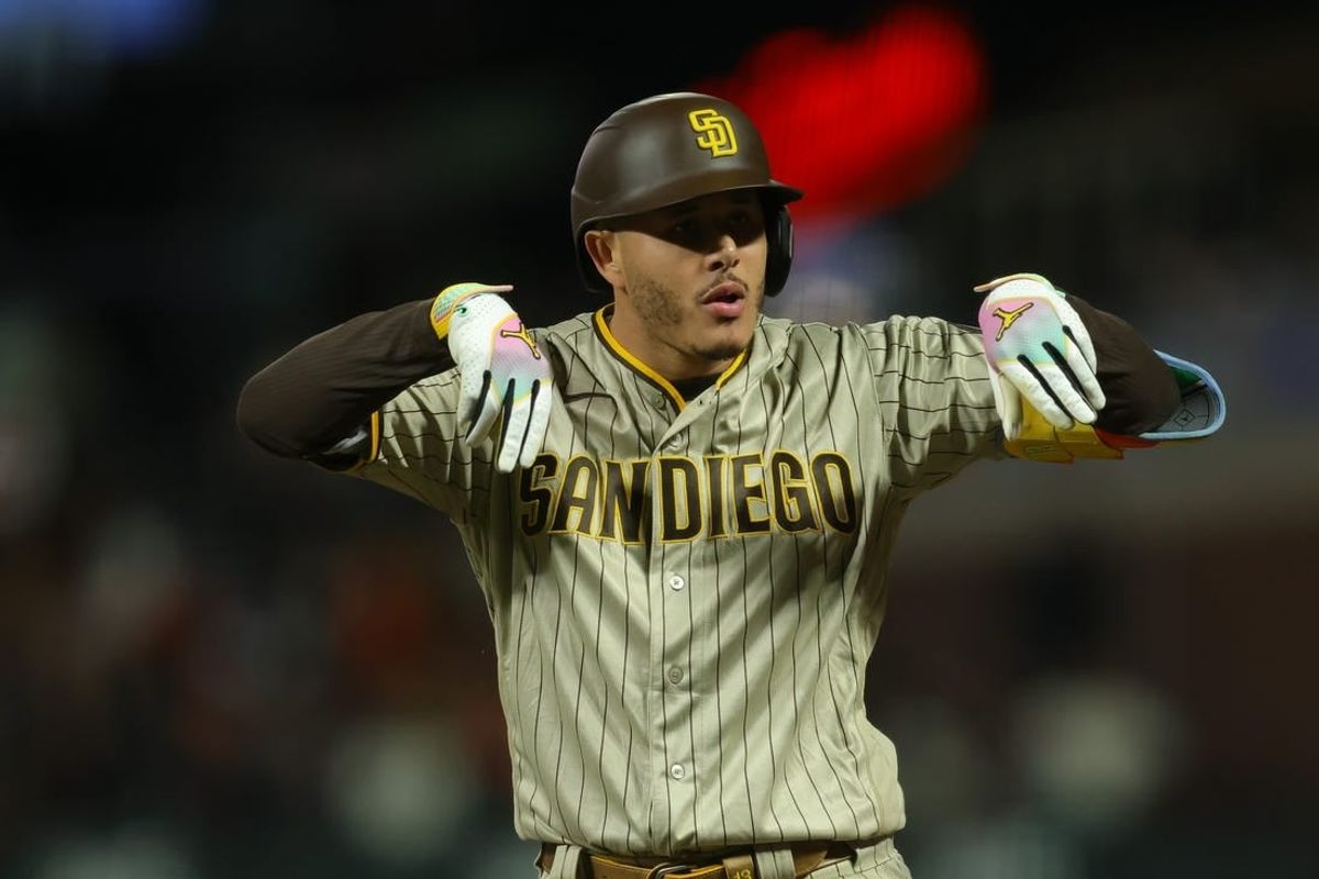 Sep 25, 2023; San Francisco, California, USA;  San Diego Padres third baseman Manny Machado (13) celebrates after a single during the ninth inning against the San Francisco Giants at Oracle Park.
