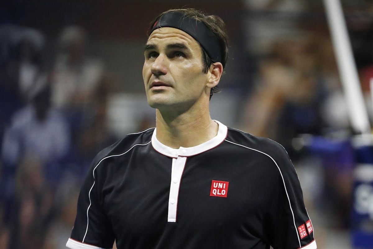 Sep 3, 2019; Flushing, NY, USA; Roger Federer of Switzerland looks at the board between points against Grigor Dimitrov of Bulgaria (not pictured) in a quarterfinal match on day nine of the 2019 US Open tennis tournament at USTA Billie Jean King National Tennis Center. Mandatory Credit: Geoff Burke-Imagn Images