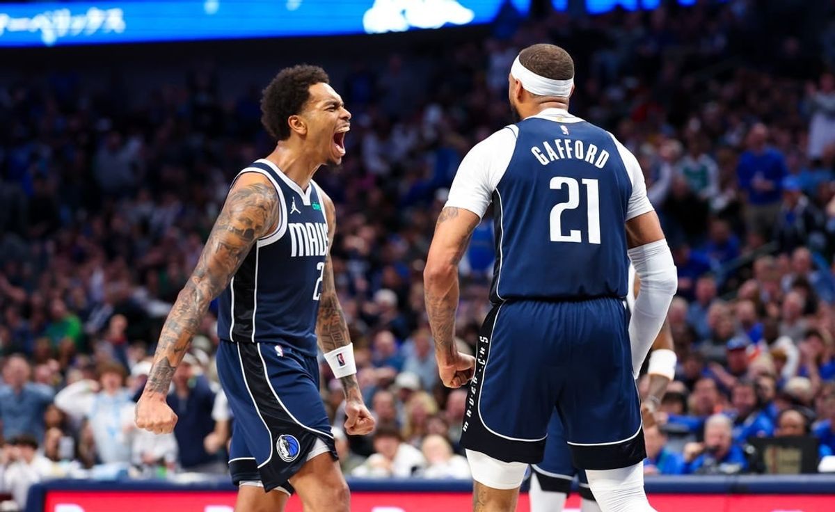 Feb 10, 2024; Dallas, Texas, USA; Dallas Mavericks forward P.J. Washington (25) celebrates with Dallas Mavericks center Daniel Gafford (21) during the second half against the Oklahoma City Thunder at American Airlines Center.