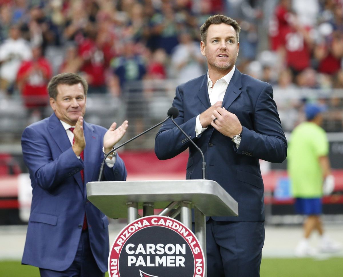 Former Arizona Cardinals quarterback Carson Palmer prepares to address the crowd during his Ring of Honor induction ceremony during halftime against the Seattle Seahawks September 29, 2019.

Seahawks Vs Cardinals