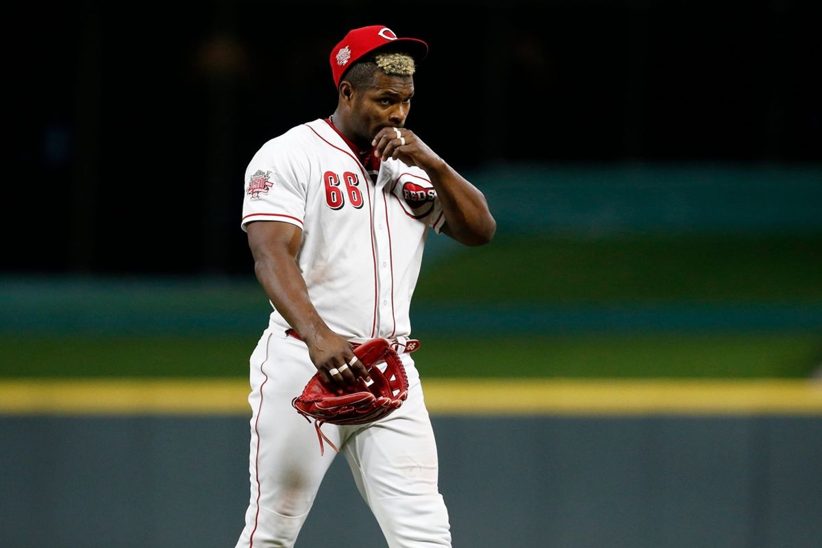 Cincinnati Reds right fielder Yasiel Puig (66) exits the field for the final time as a Reds player at the end of the top of the ninth inning of the MLB National League game between the Cincinnati Reds and the Pittsburgh Pirates at Great American Ball Park in downtown Cincinnati on Tuesday, July 30, 2019. The Pirates won 11-4.

Pittsburgh Pirates At Cincinnati Reds