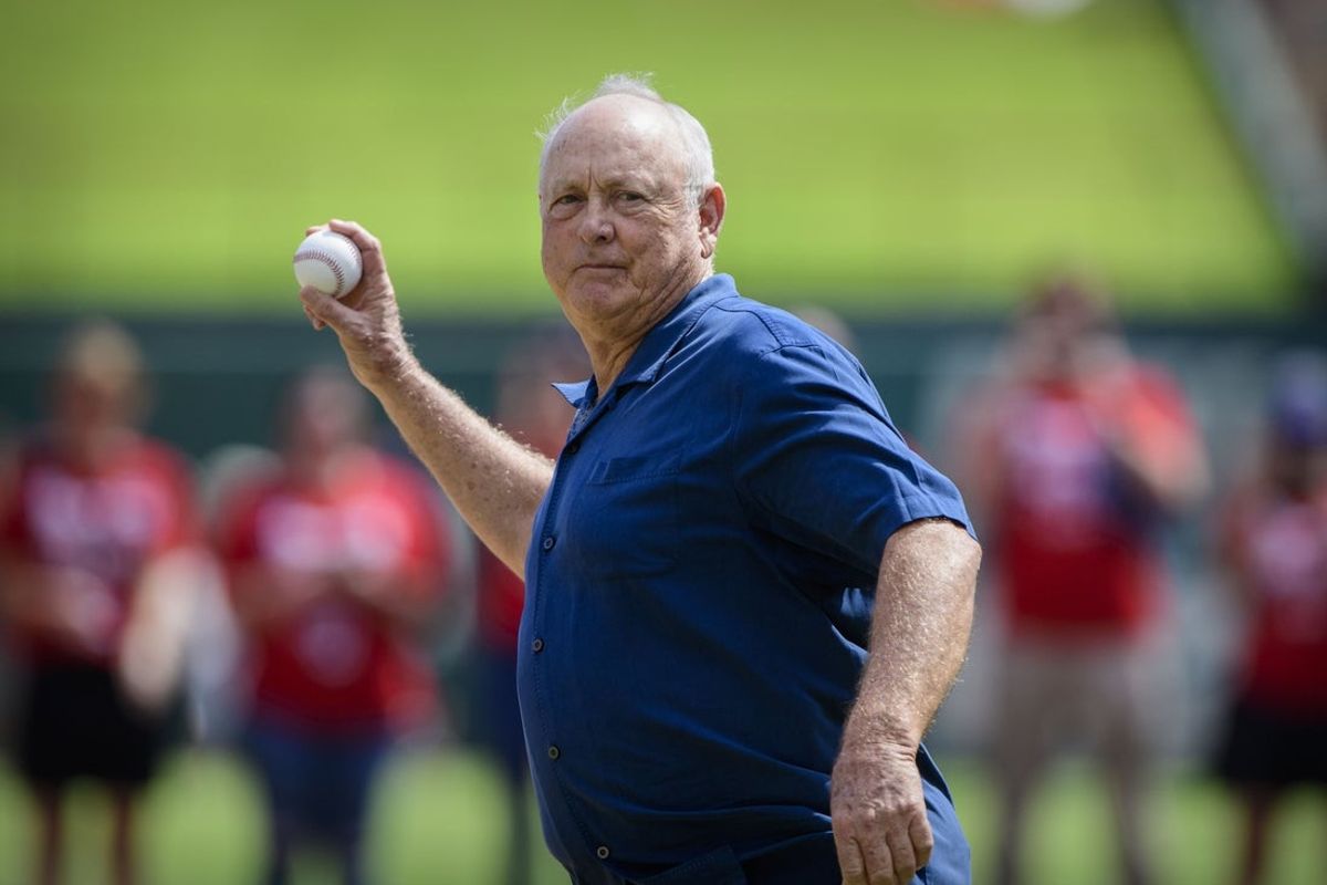 Sep 29, 2019; Arlington, TX, USA; Former Texas Rangers pitcher Nolan Ryan throws out the first pitch before the game between the Rangers and the New York Yankees in the final home game at Globe Life Park in Arlington. Mandatory Credit: Jerome Miron-Imagn Images