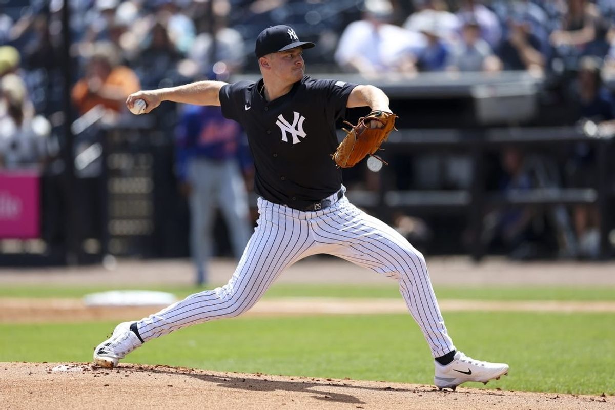 Mar 25, 2024; Tampa, Florida, USA;  New York Yankees starting pitcher Clarke Schmidt (36) throws a pitch against the New York Mets in the first inning at George M. Steinbrenner Field.