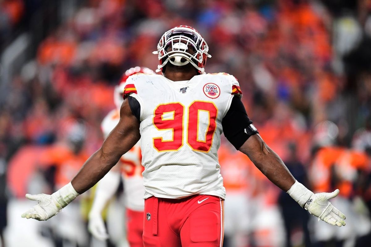 Oct 17, 2019; Denver, CO, USA; Kansas City Chiefs defensive end Emmanuel Ogbah (90) reacts to a tipped pass in the third quarter against the Denver Broncos at Empower Field at Mile High. Mandatory Credit: Ron Chenoy-Imagn Images