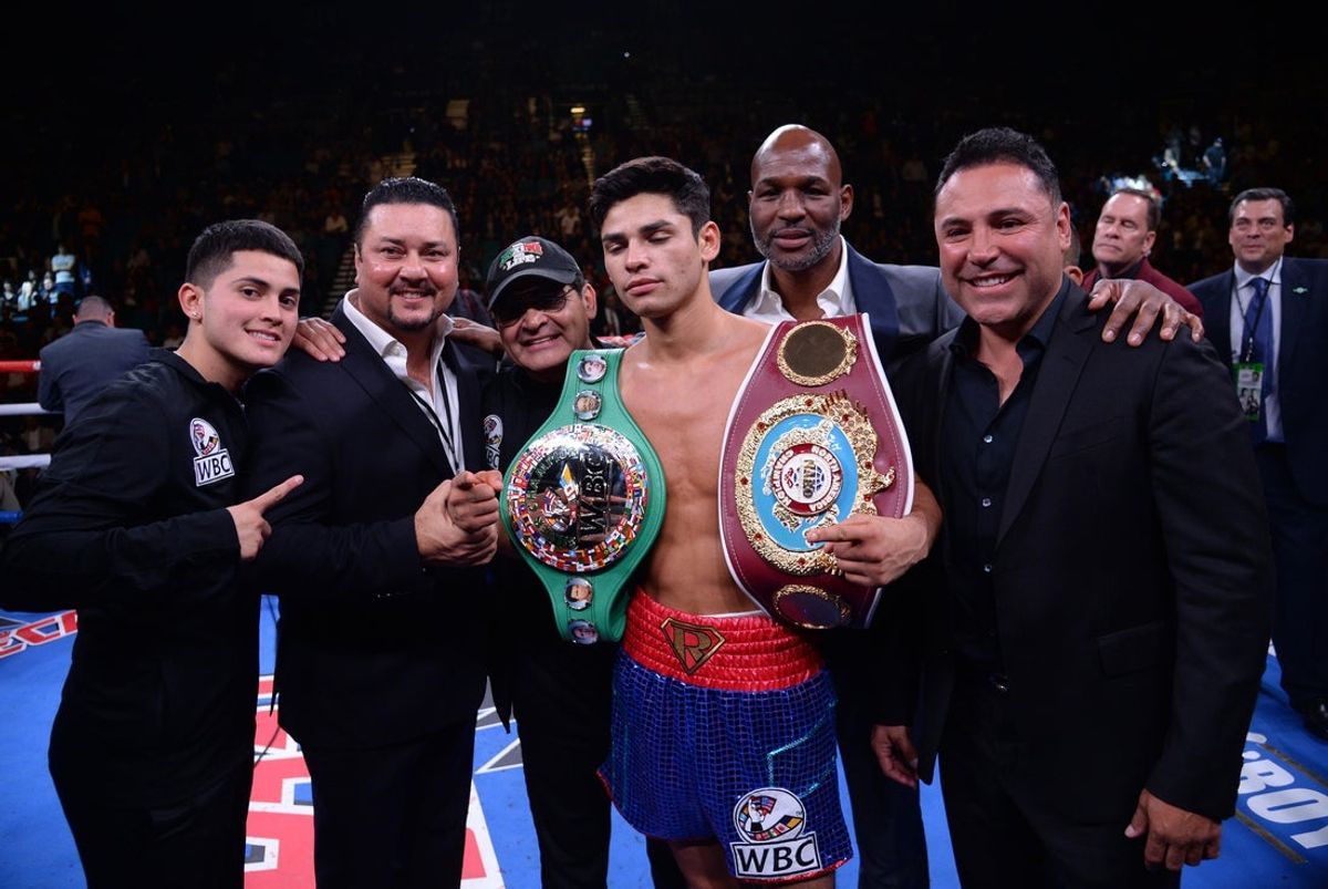 Nov 2, 2019; Las Vegas, NV, USA; Ryan Garcia (blue trunks) celebrates after knocking out Romero Duno (not pictured) in their WBC silver and NABO lightweight title bout at MGM Grand Garden Arena. Garcia won via first round TKO. Mandatory Credit: Joe Camporeale-Imagn Images