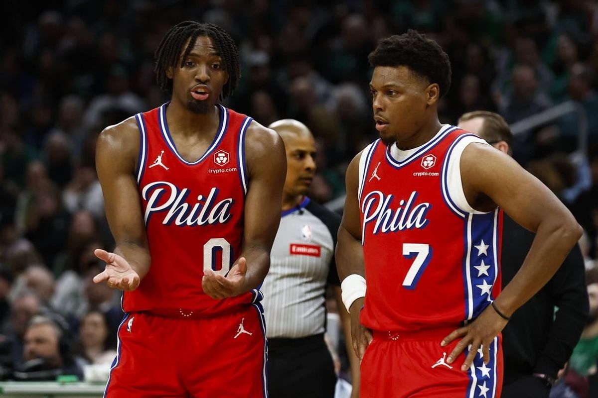 Feb 27, 2024; Boston, Massachusetts, USA; Philadelphia 76ers' Tyrese Maxey (0) talks with Kyle Lowry (7) during the second half of their loss to the Boston Celtics at TD Garden.