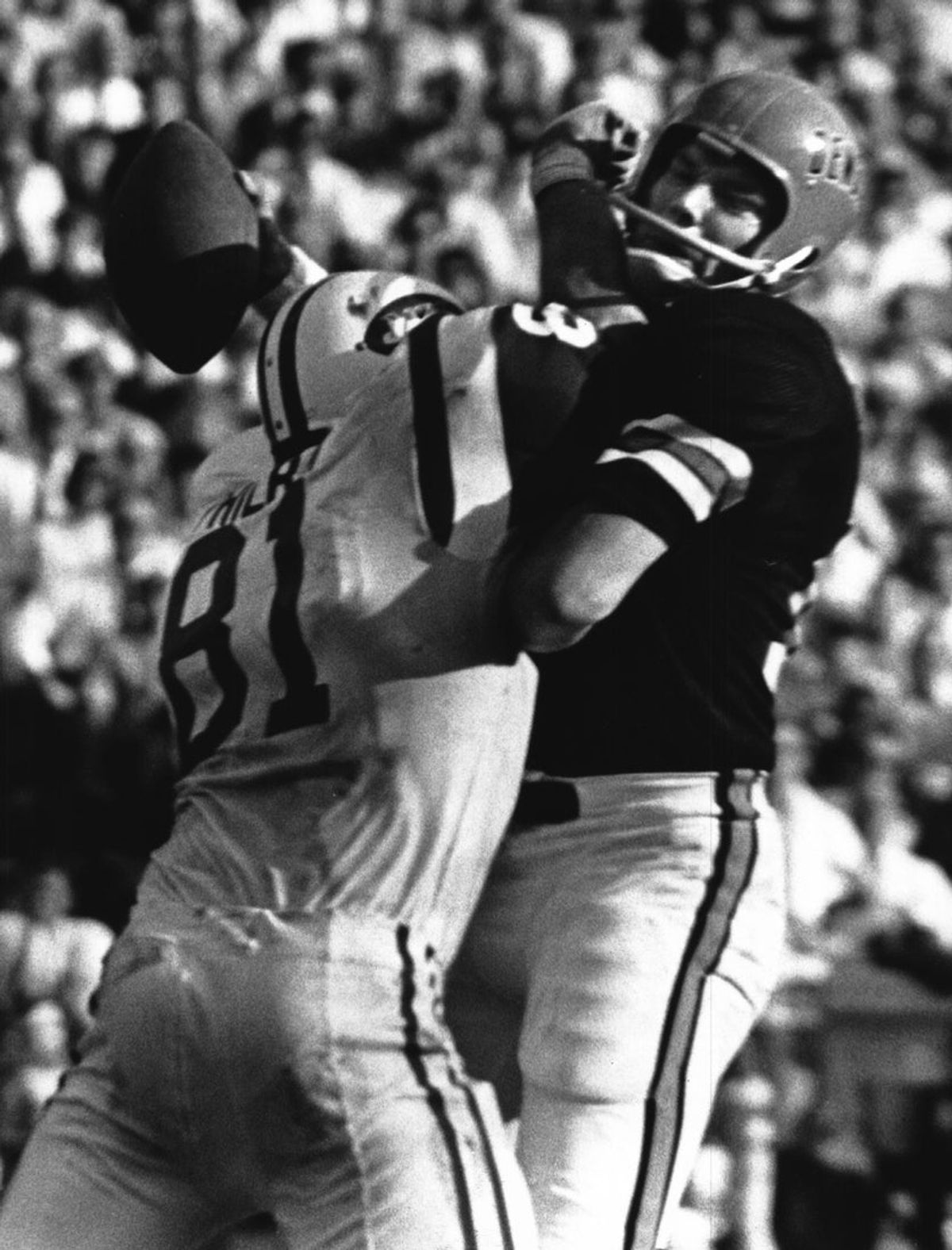 OCTOBER 14, 1969: Have A Bite Of Football, Sam...Jets' defensive end Gerry Philbin slams into Sam Wyche, throwing the Bengal quarterback for a 10-yard loss.

Bengals119
