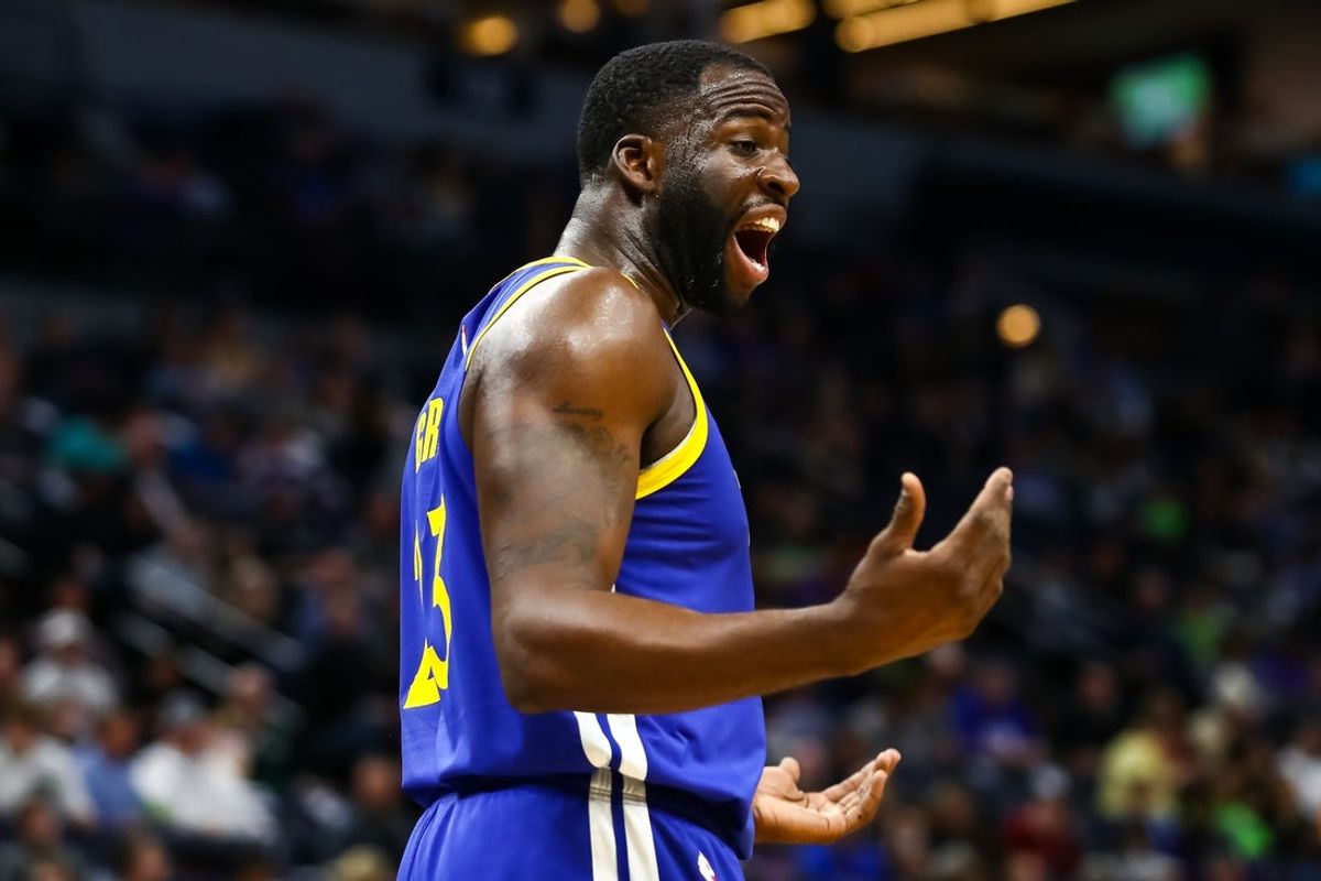 Jan 2, 2020; Minneapolis, Minnesota, USA; Golden State Warriors forward Draymond Green (23) reacts to a fan in the third quarter during a game against the Minnesota Timberwolves at Target Center. Mandatory Credit: David Berding-Imagn Images