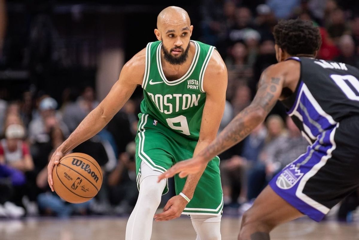 Dec 20, 2023; Sacramento, California, USA; Boston Celtics guard Derrick White (9) controls the ball against Sacramento Kings guard Malik Monk (0) during the fourth quarter at Golden 1 Center.