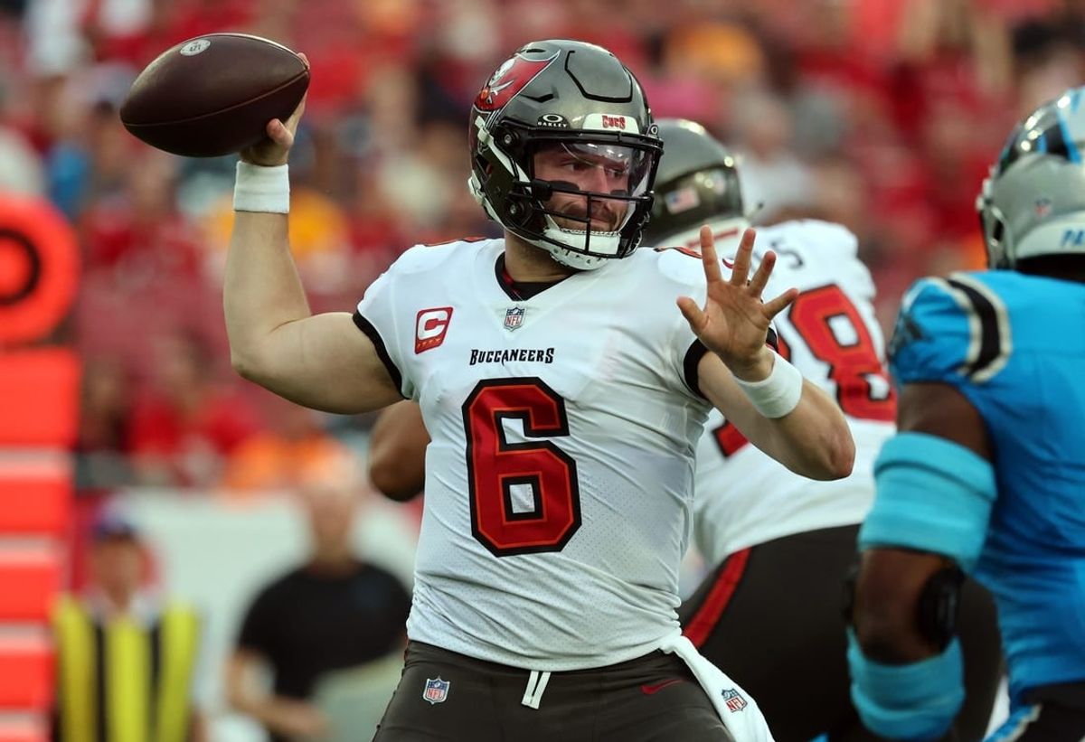 Dec 3, 2023; Tampa, Florida, USA; Tampa Bay Buccaneers quarterback Baker Mayfield (6) throws the ball against the Carolina Panthers during the first quarter at Raymond James Stadium.