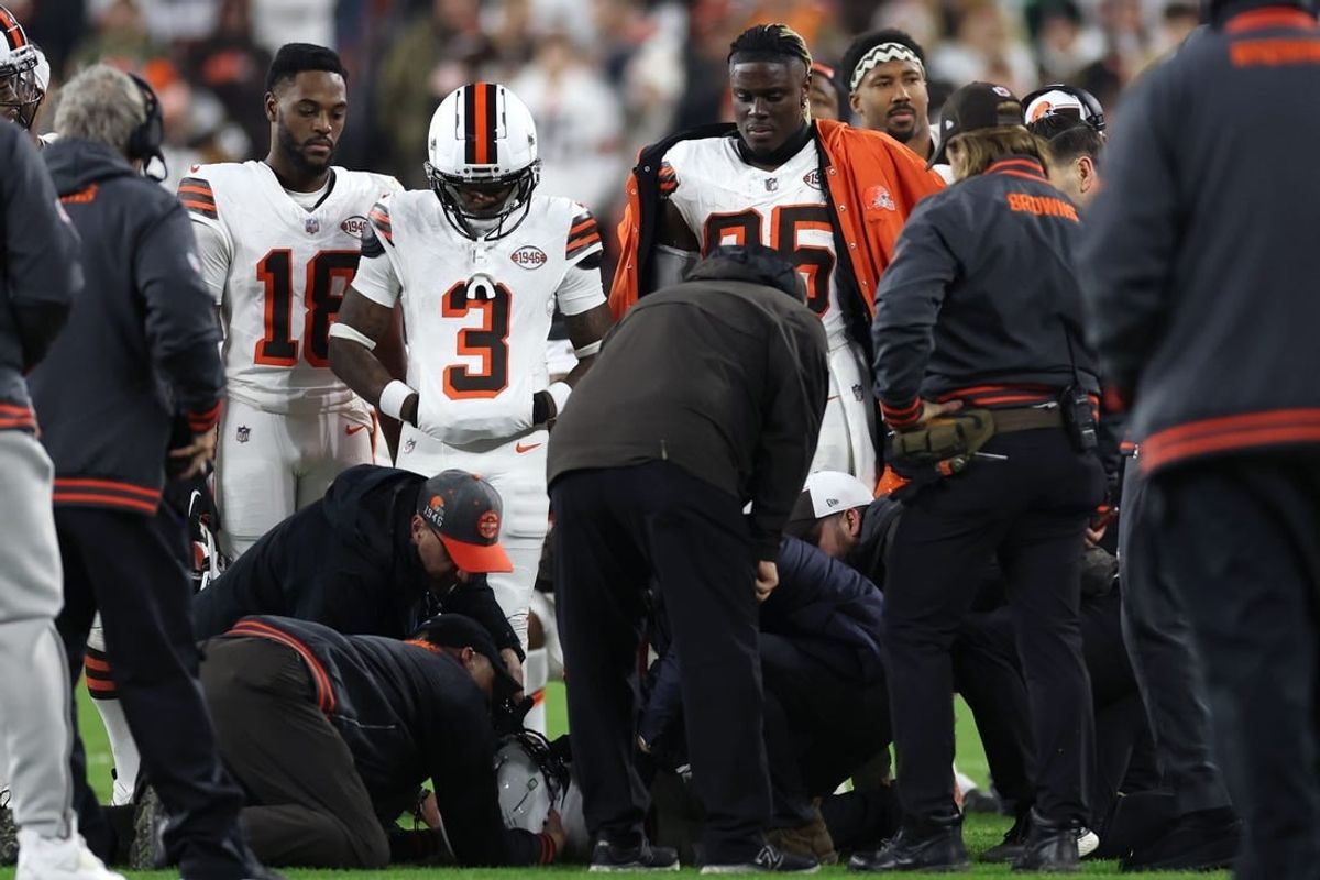 Dec 28, 2023; Cleveland, Ohio, USA; Cleveland Browns wide receiver Elijah Moore (8) is checked on by trainers during the first half against the New York Jets at Cleveland Browns Stadium.