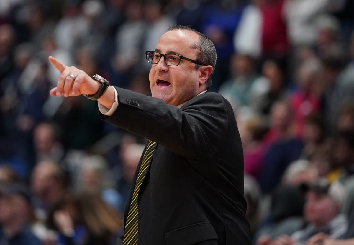 Mar 2, 2020; Hartford, Connecticut, USA; South Florida Bulls head coach Jose Fernandez watches from the sideline as they take on the UConn Huskies in the first half at XL Center. Mandatory Credit: David Butler II-Imagn Images